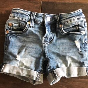 Distressed 7 jean shorts.